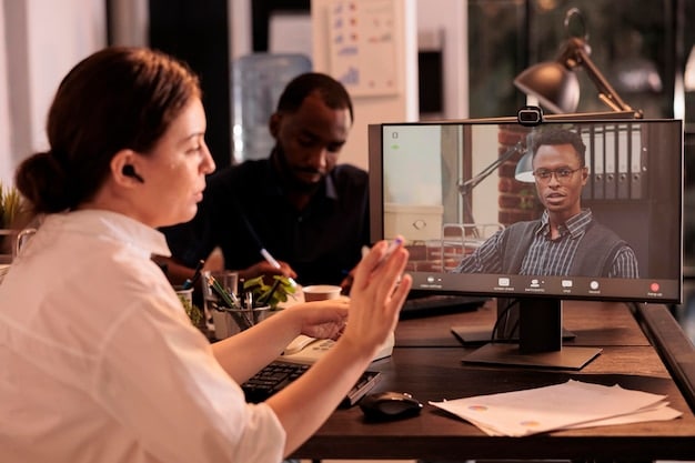 A diverse team collaborating remotely via video conference, showcasing the benefits of delegation and teamwork in a virtual setting.