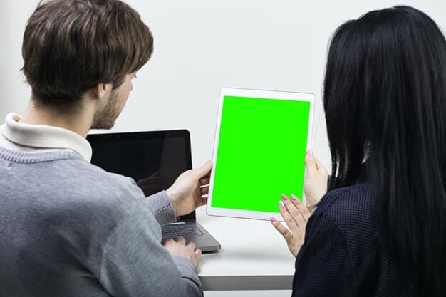 A split screen showing someone participating in an online coding course on one side and applying those skills to a personal project on the other, illustrating the blend of structured learning and practical application necessary for effective upskilling.