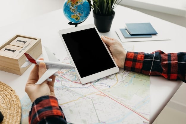A digital nomad planning a route on a map, with a laptop beside them displaying an internet coverage map.