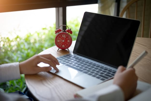 An image showing a close-up of a laptop screen with a time-tracking application open, emphasizing the importance of accurate record-keeping for remote employee hours.
