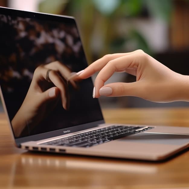 A close-up of a digital timer set to 25 minutes on a laptop screen, with a person's hands typing on the keyboard. A sticky note with the word 