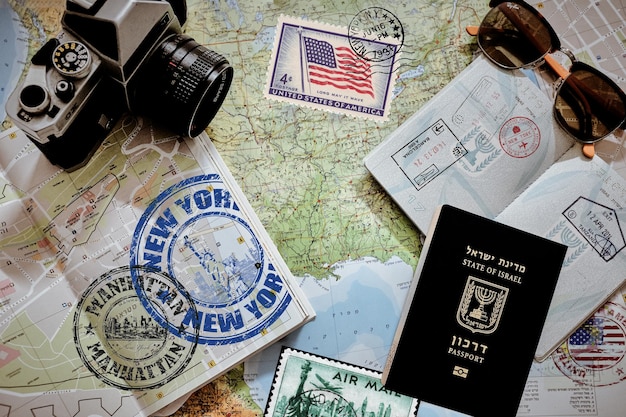 A close-up shot of a US passport with various entry and exit stamps, emphasizing the theme of international travel and digital nomadism.