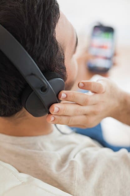 A close-up shot displaying a person using a headset with a built-in microphone for real-time voice translation during a video conference, emphasizing clear audio input and accurate language conversion for seamless global communication.