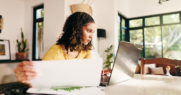 A freelancer sitting at a desk, reviewing tax forms on a computer screen, with a look of understanding and relief.