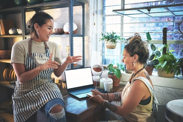 Two freelancers discussing rates in a coffee shop. One freelancer is actively listening, with a notepad in hand, while the other is gesturing and explaining their value proposition. The atmosphere is relaxed yet professional, emphasizing the importance of preparation in negotiation.