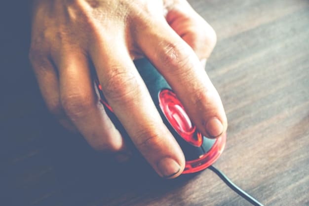 Close-up of a hand hovering over a mouse, about to click on a suspicious-looking link in an email. The background shows a cluttered desktop with multiple browser windows open. It should convey a sense of urgency and potential danger.