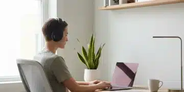 Master Your Remote Work: Eliminate Distractions for 2026 Success Hyper-focused individual working in a minimalist, distraction-free home office setup.